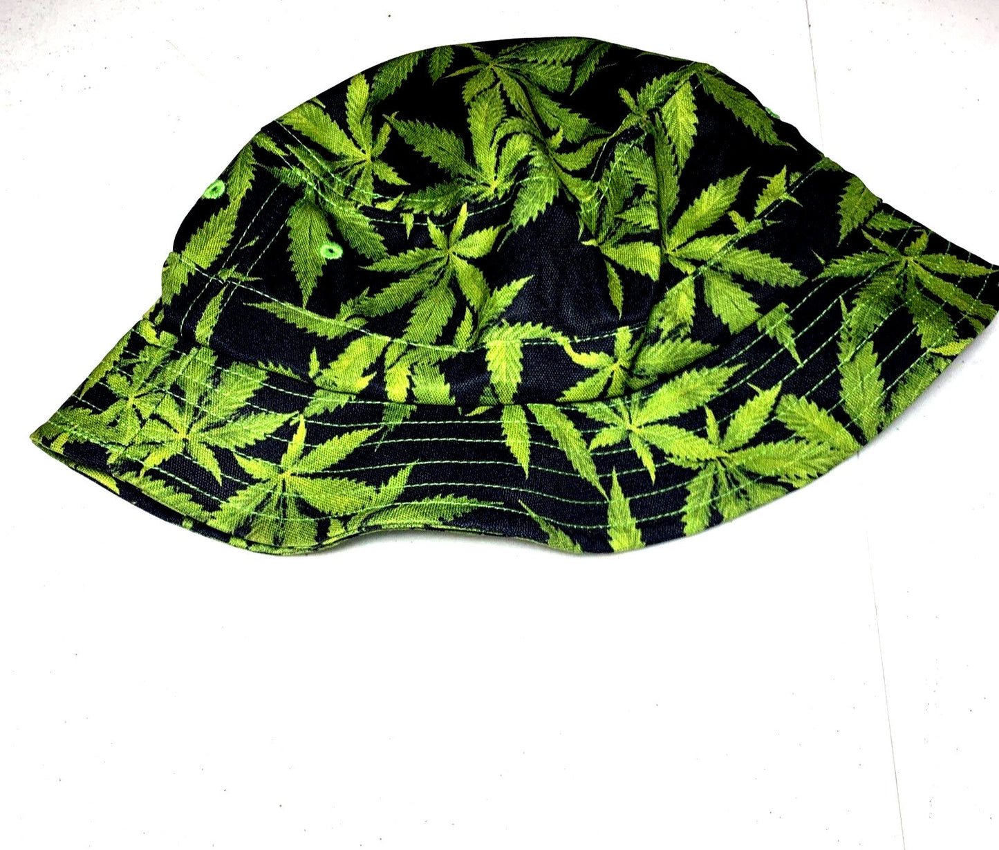 Pot Leaf Bucket Hat with green marijuana pattern on black fabric.