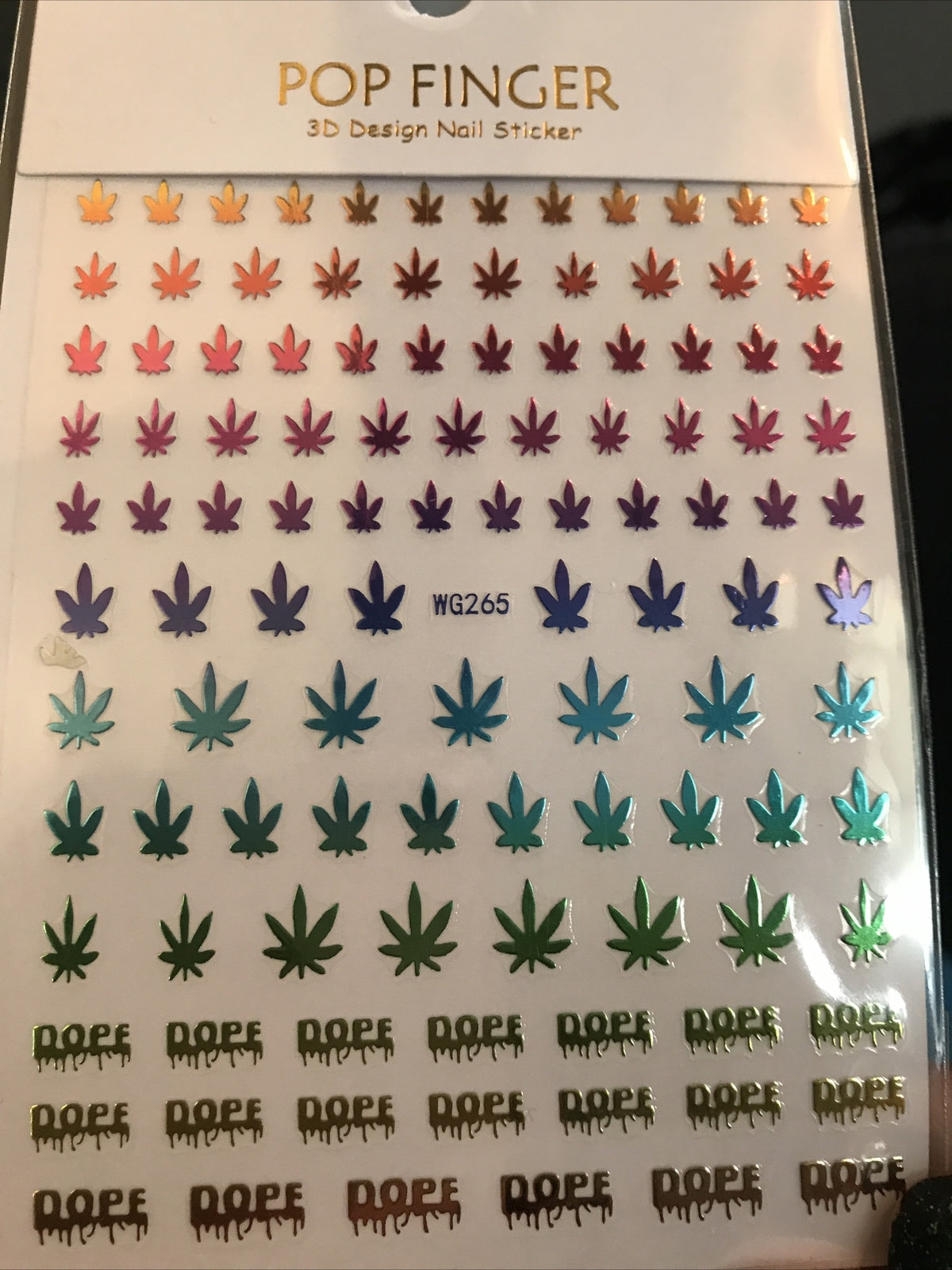 Marijuana leaf 3D nail art stickers with colorful designs.