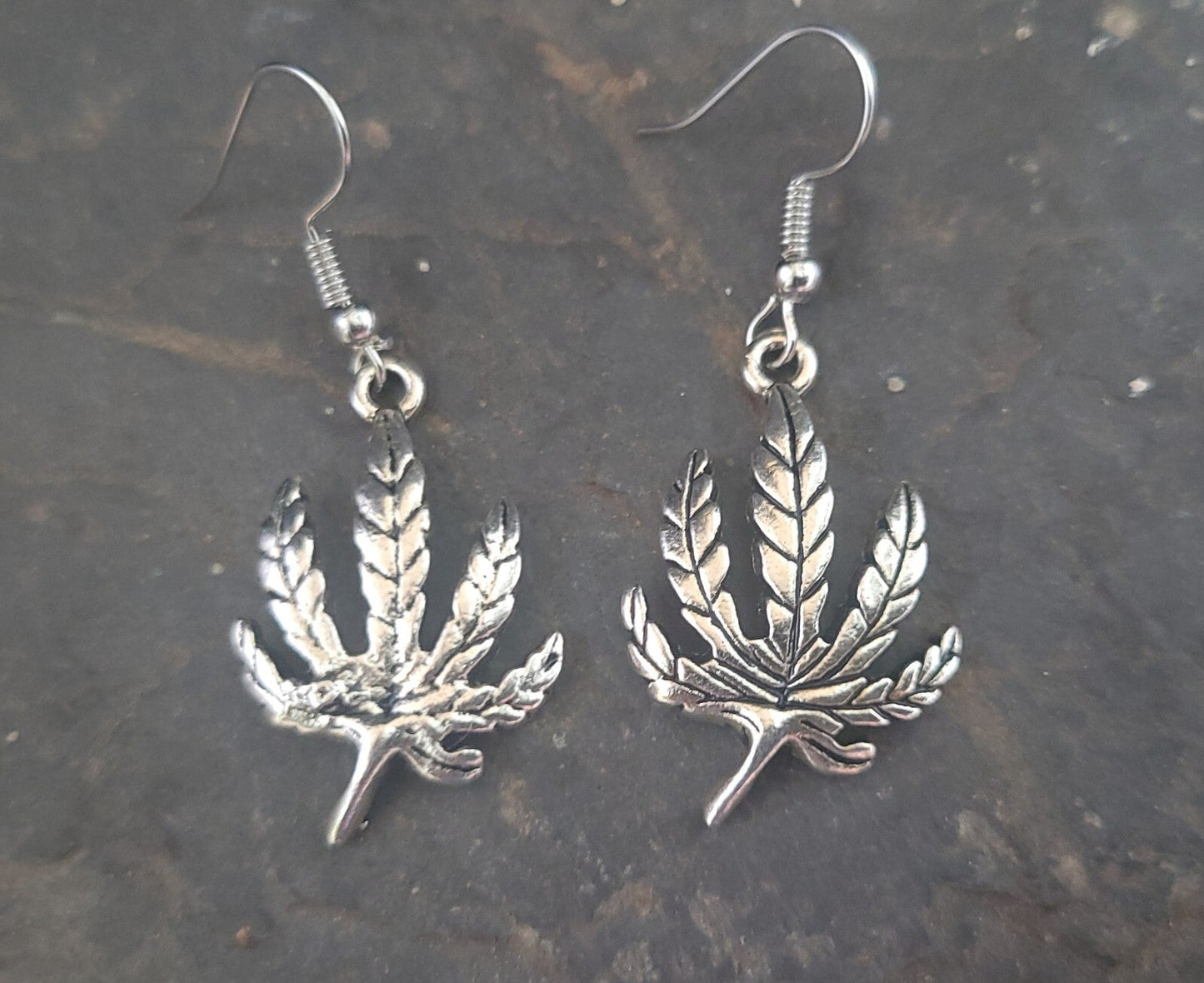 Silver pot leaf earrings with hypoallergenic hooks.