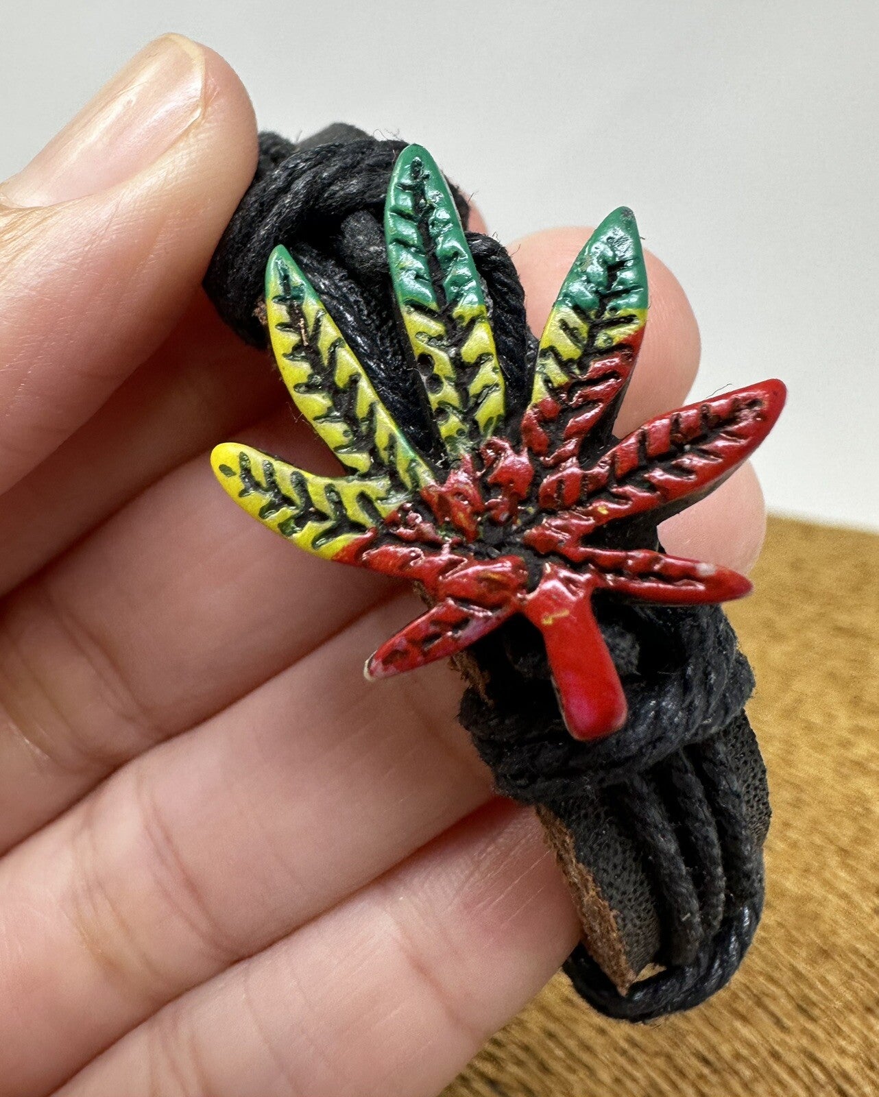 Adjustable Black Leather Bracelet with Rasta-Colored Marijuana Leaf Charm