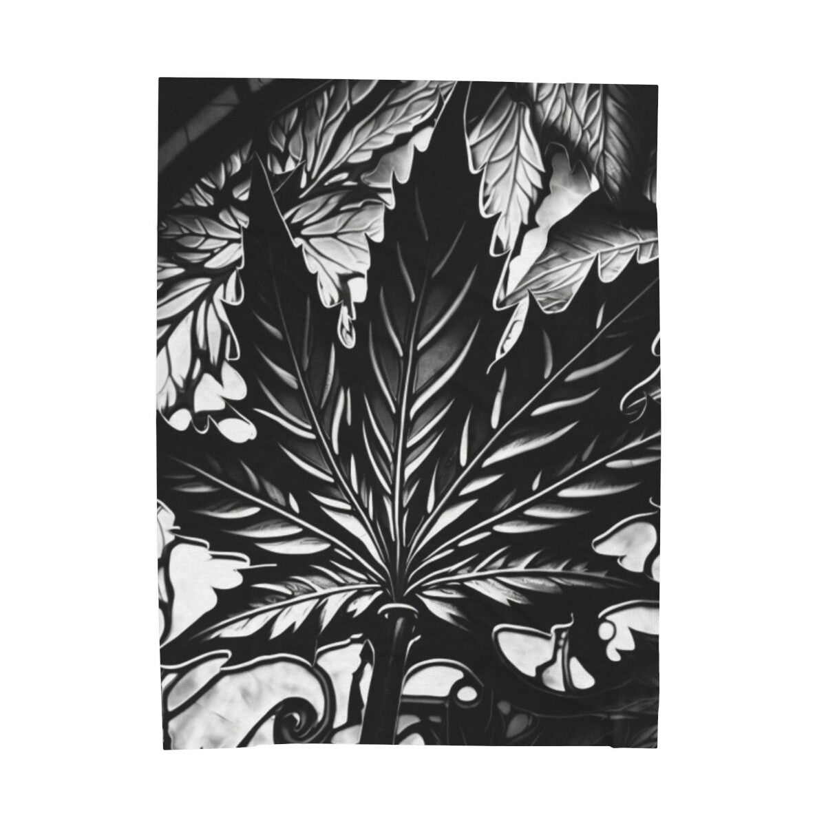Velveteen plush blanket with marijuana leaf graphic design.