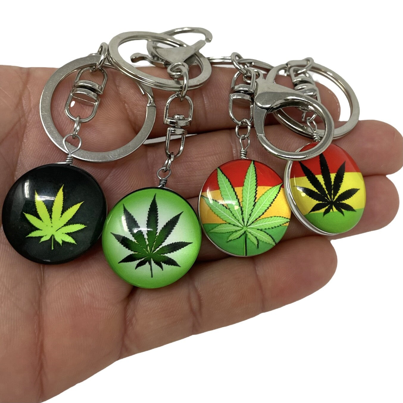 Rasta Weed Cannabis keychain with vibrant designs and durable 3D domed stickers.