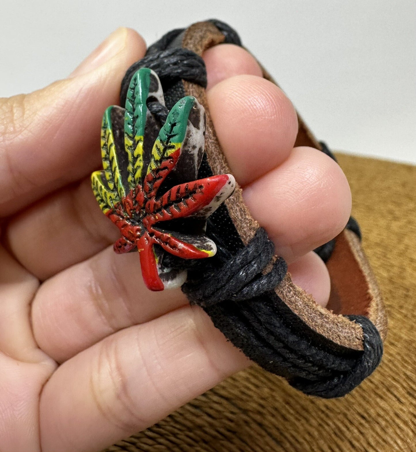 Adjustable Black Leather Bracelet with Rasta-Colored Marijuana Leaf Charm