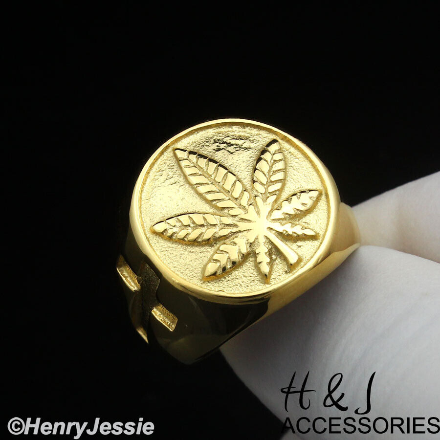 Gold ion-plated stainless steel ring with marijuana leaf cross design.