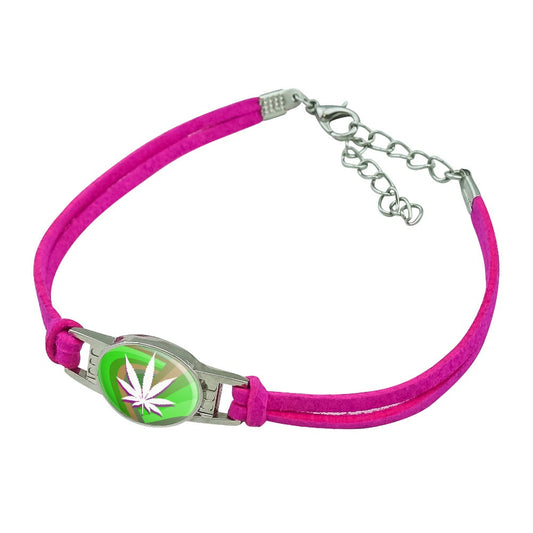 Pink suede leather metal bracelet with marijuana leaf design centerpiece.