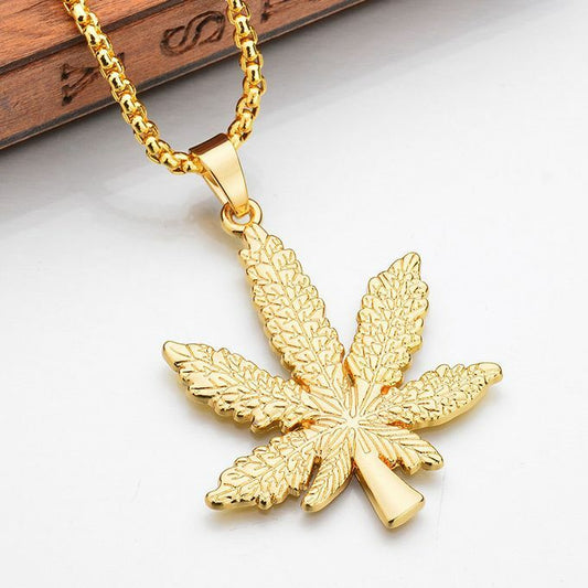 Gold marijuana weed pendant necklace featuring a hemp leaf design, perfect gift for smokers and stoners.