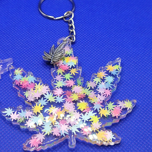 Pot Leaf Keychain handcrafted from resin with neon embedded design.