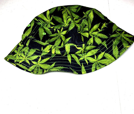Pot Leaf Bucket Hat with green marijuana pattern on black fabric.