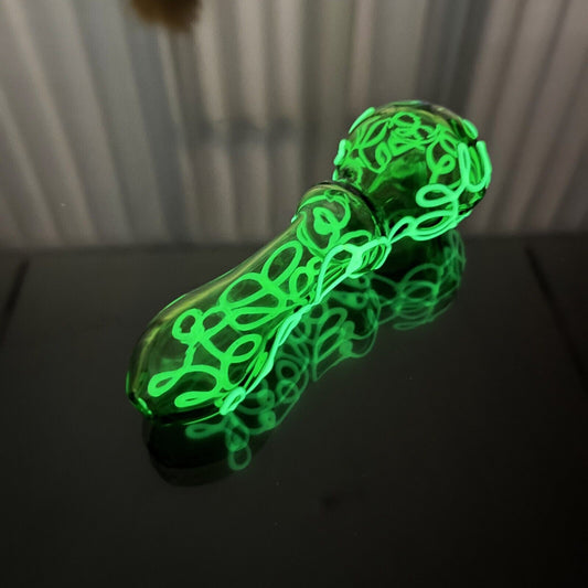 Luminous Glass Smoking Pipe with Cyan-Blue and Yellow Twisted Wire Design.