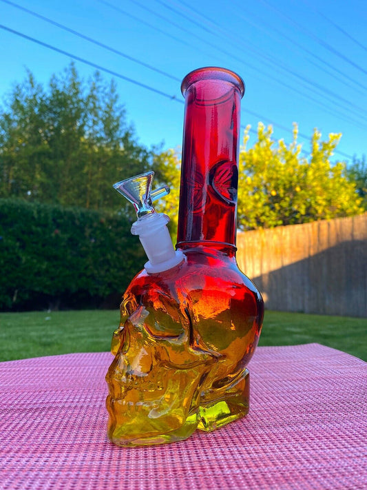 Red Skull 9" premium glass water pipe bong with ice catcher, featuring a handmade skull design and 14mm male bowl.