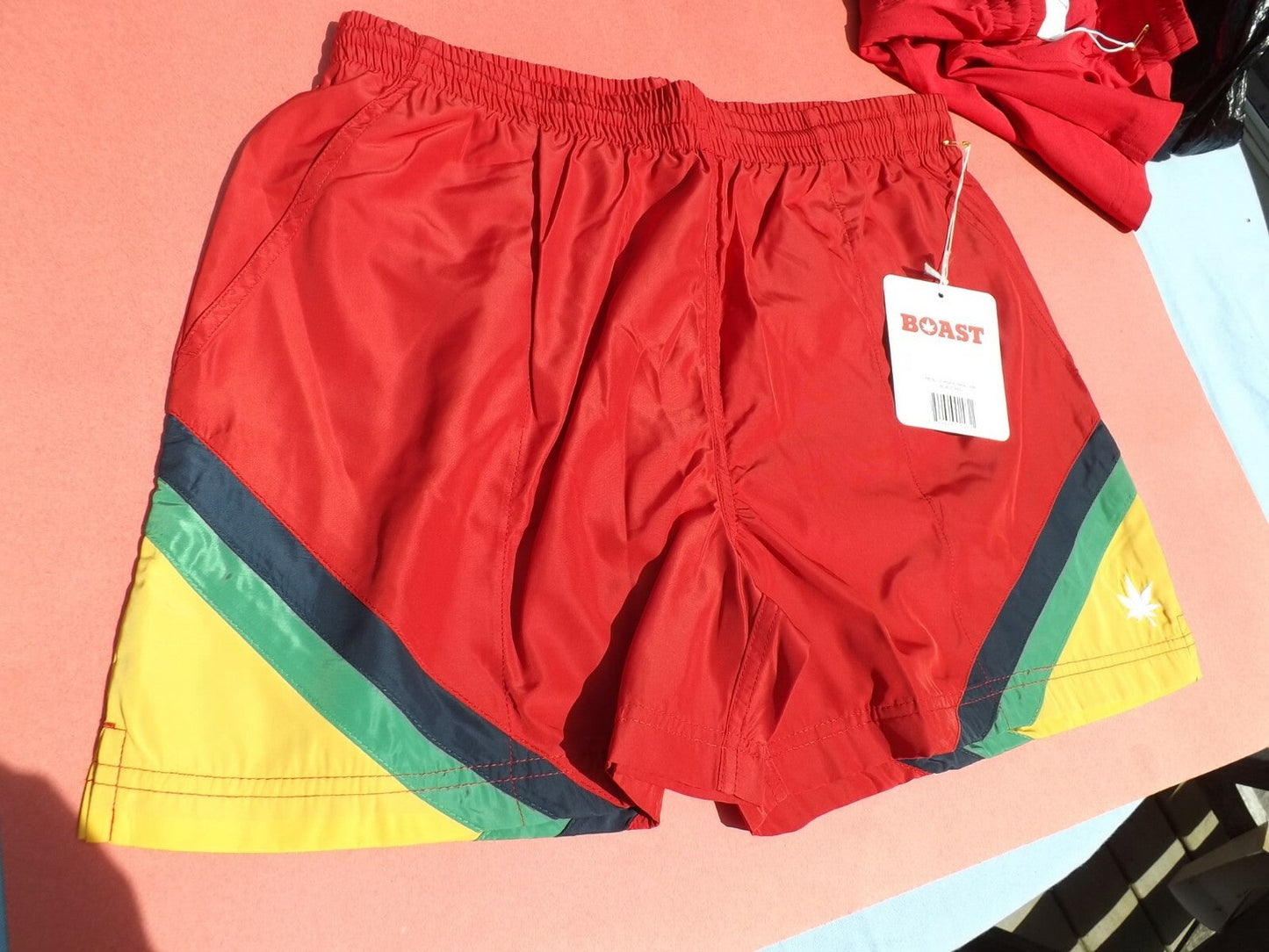 Pr NWT BOAST men's medium red/navy/green/yellow tennis swim trunks with pot leaf design.