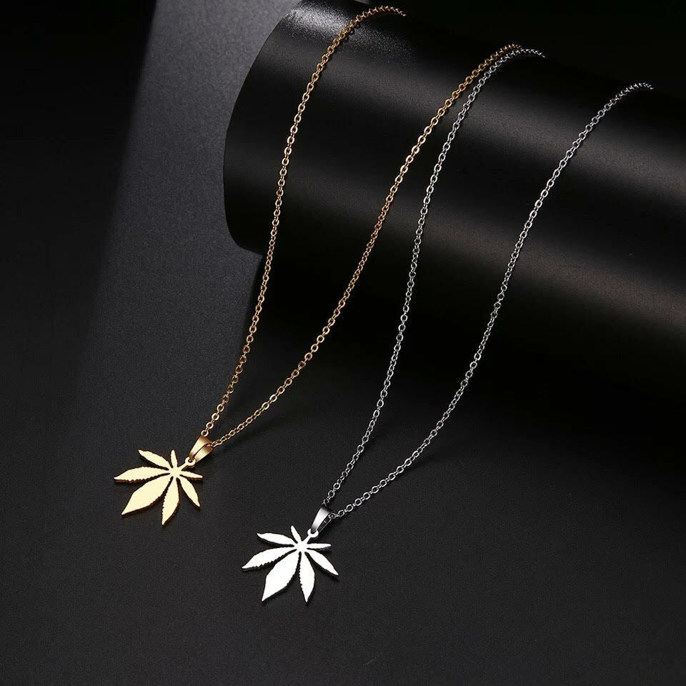 Stainless steel weed leaf necklaces with gold and silver pendants.