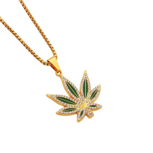 Gold colored stainless steel pendant necklace with cannabis leaf design.