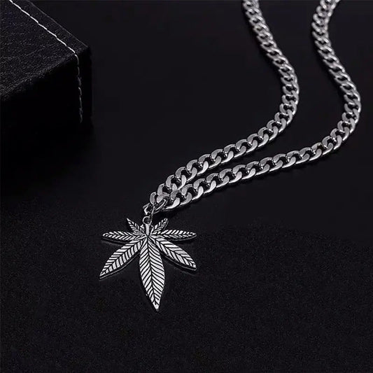 Silvery cannabis leaf pendant necklace with chain.