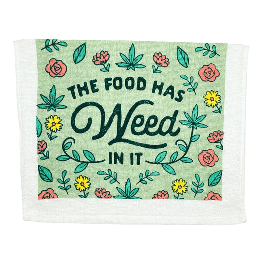 Funny kitchen tea towel with "The Food Has Weed In It" design and floral accents.