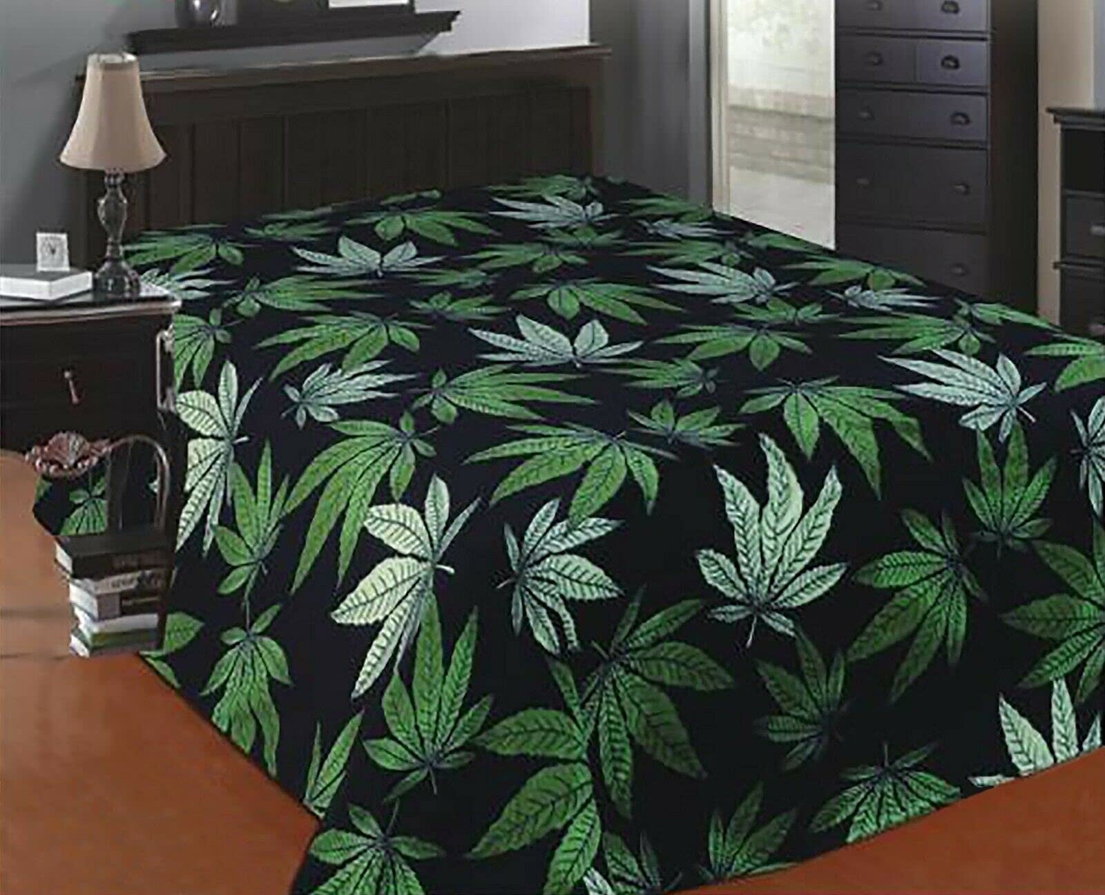 Marijuana leaf fleece blanket on bed, super soft and cozy.