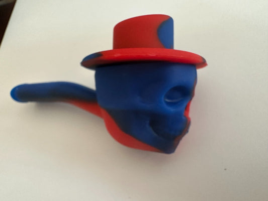 4.5″ silicone hand pipe with red and blue skull design, travel size.