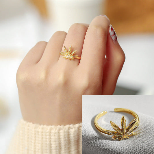 Gold over sterling silver marijuana leaf ring band in open wrap design.