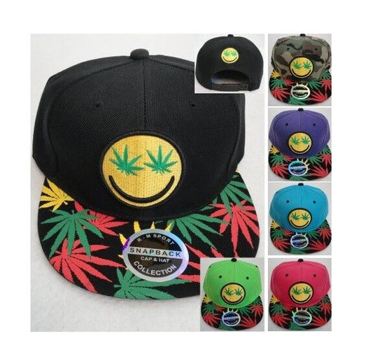 Smiley face marijuana leaf eyes emoji on snapback hat with colorful weed leaves on bill.