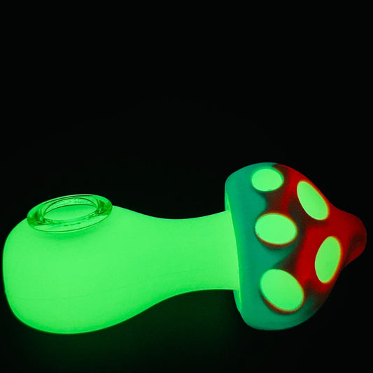 Glowing pink and blue mushroom silicone smoking pipe with glass bowl.