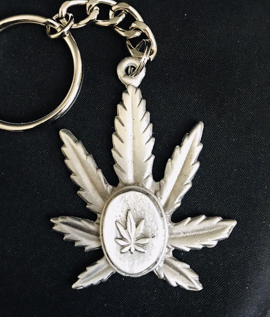 Pewter marijuana leaf silver metal keychain.