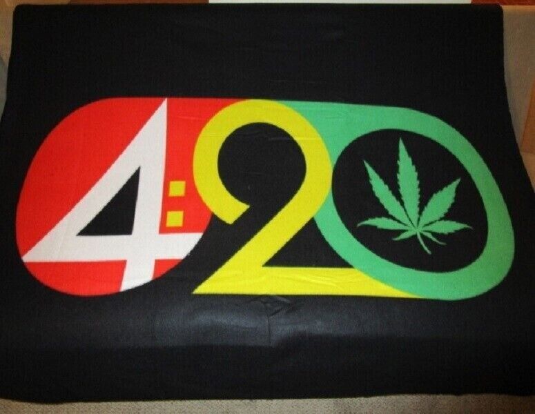 420 marijuana pot leaf fleece blanket with red, yellow, and green sunglasses design.