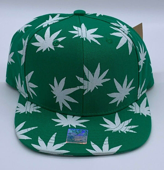 Green pot leaf pattern baseball cap with white marijuana designs, snapback style.
